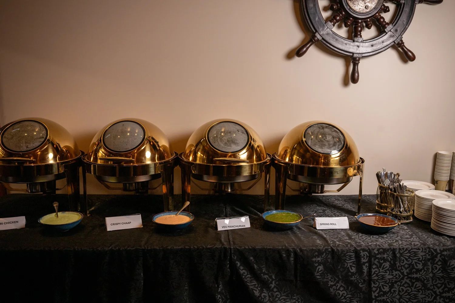 Gold chafing dishes on a catering buffet